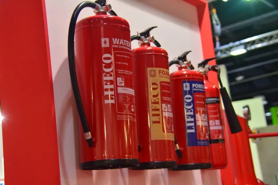 Powder extinguisher in an industrial setting